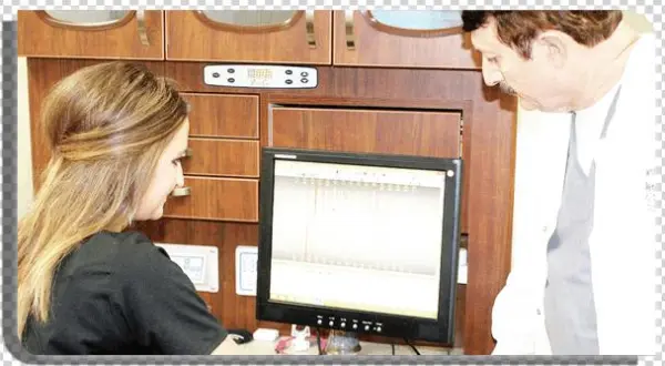 Detists And Staff In Front Of Their Clinic