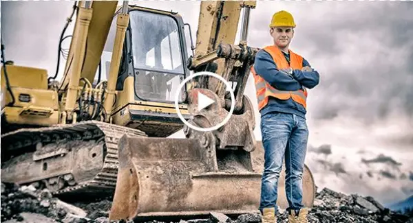Construction Worker In Front Of Excavator